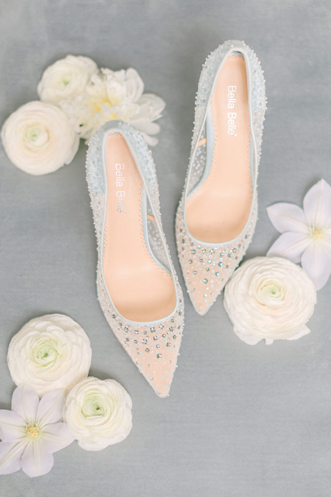 Simply detailed wedding heels by Bella Belle photographed before the bride finishes getting ready for her wedding day