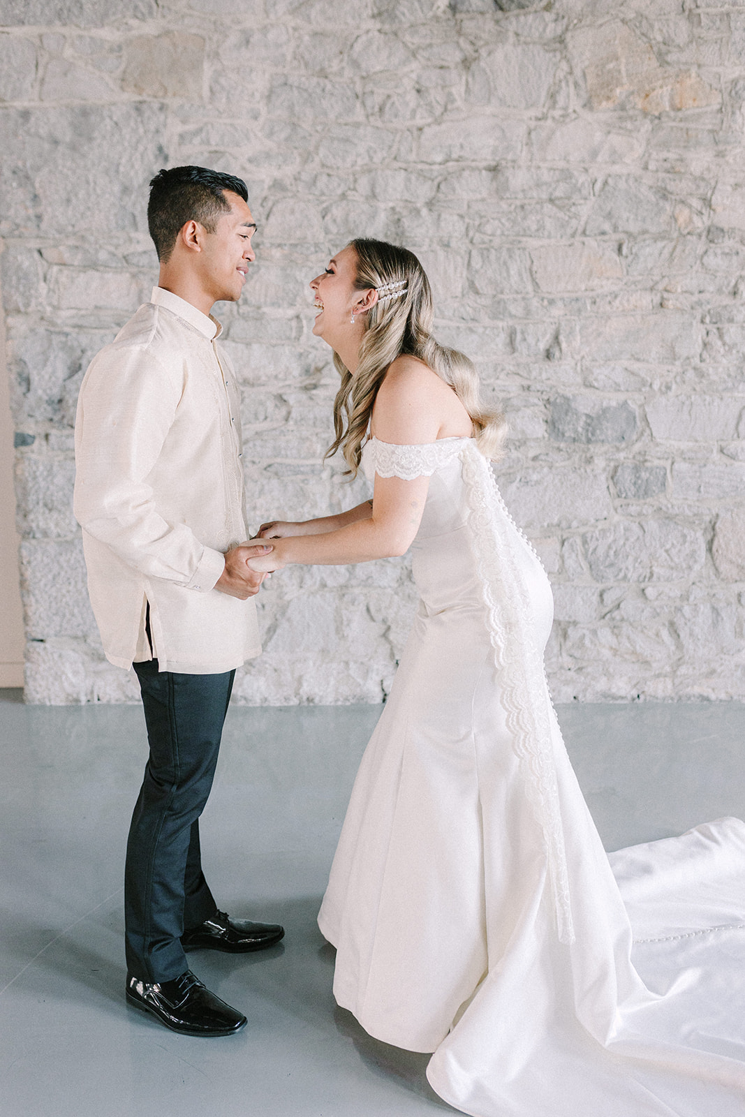 Young couple has a private moment for their first look wedding photos in Montreal