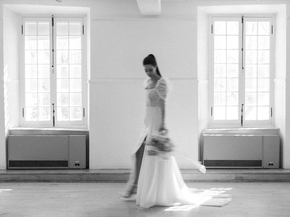 Artistic blurry black and white film photography image of a beautiful bride in Montreal 