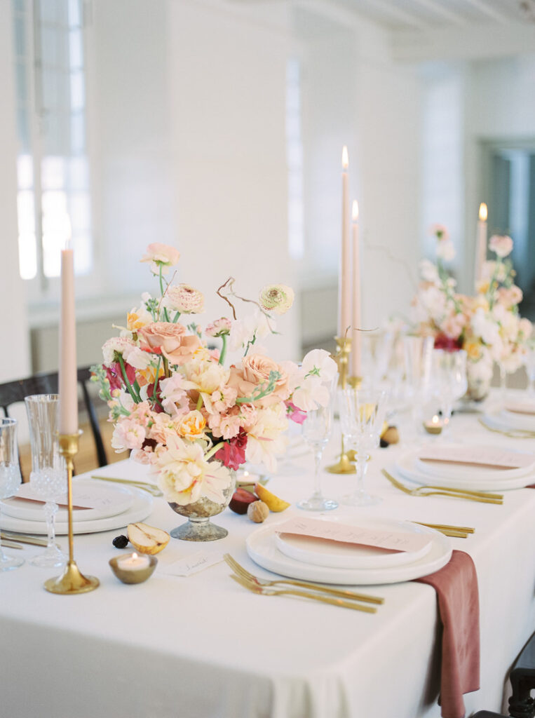 stunning modern tablescape with candles lit for an intimate wedding