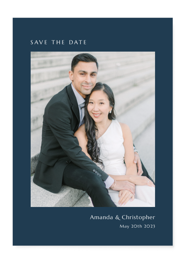 stunning well-dressed couple poses during their engagement session and the photo is used for their wedding invitations