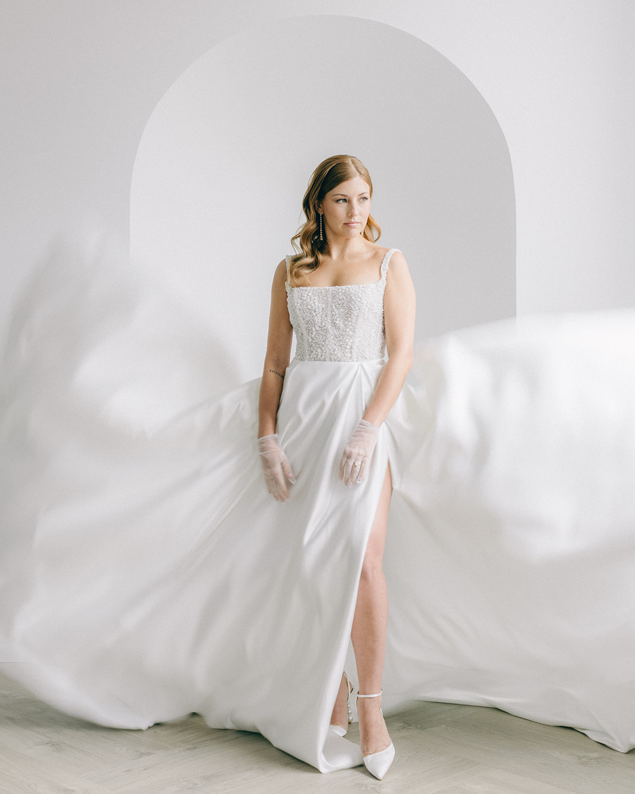 Bridal portrait with gown in motion